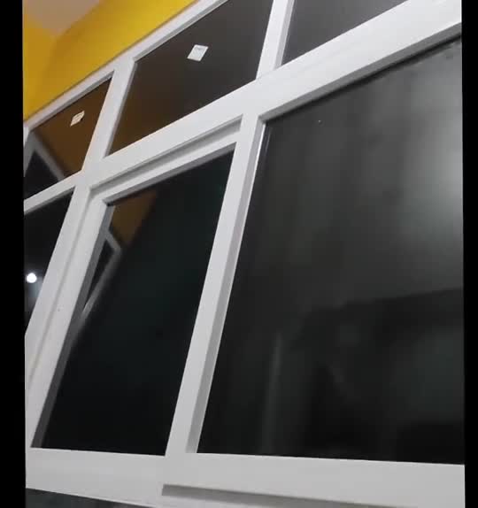 Completed white UPVC sliding window installation on residential opening